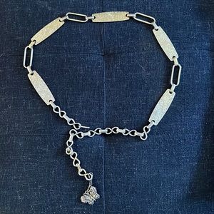 Vintage metal belt with butterfly pendant